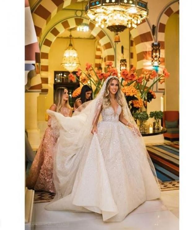 بالصور| "بيجامة بارتي وسرير الكوشة".. حفل زفاف أسطوري في أسوان