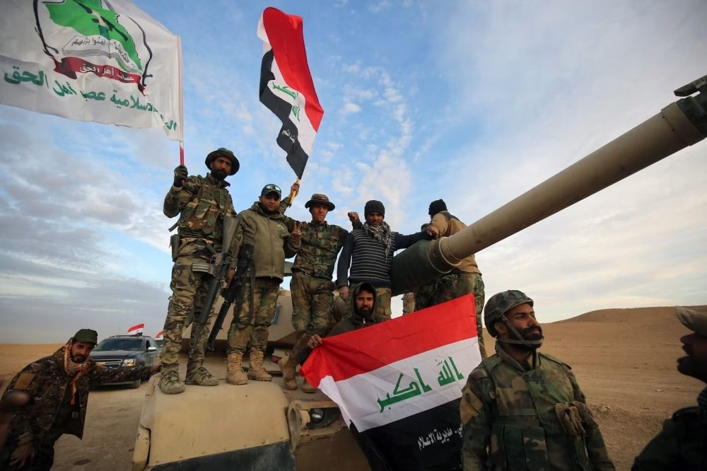 حركة عراقية جديدة تسلم سلاحها للدولة