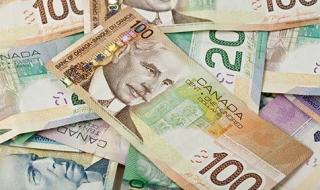 الدولار الكندي يقترب من أعلى مستوى في ثلاثة أشهر بدعم من ارتفاع النفط وآمال اتفاق تجاري مع الولايات المتحدة